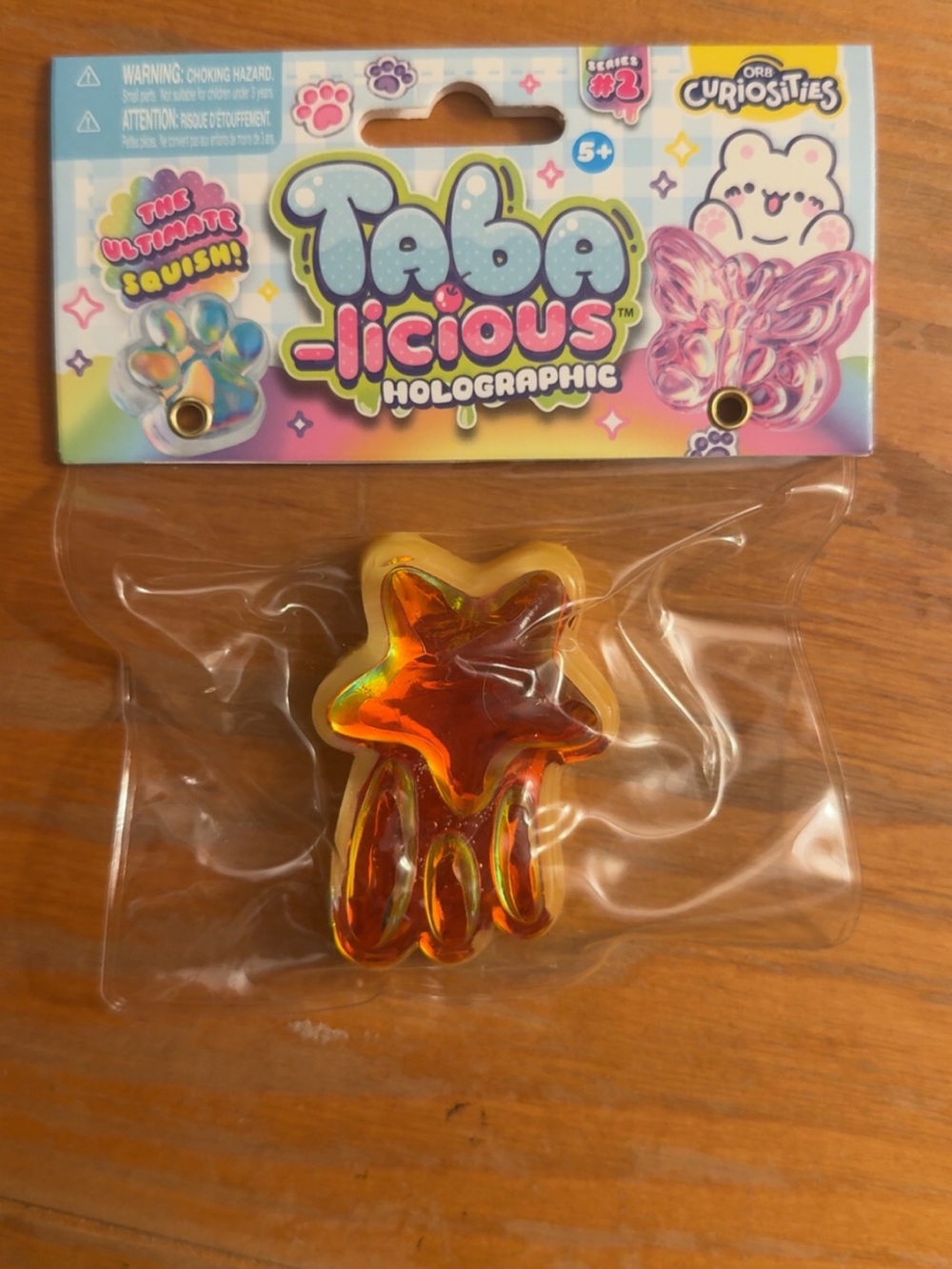 Taba-licious Holographic shooting star Squishy Pop Toy - yellow Iridescent